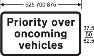 A white rectangular sign with black text  Description automatically generated