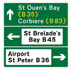Green road sign with white, black and orange text showing destinations and directions