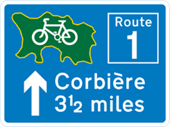 Blue and green road sign with image of bicycle and white text showing destination, distance and direction