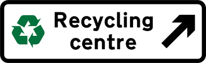 White road sign with black text and, green recycling symbol and direction
